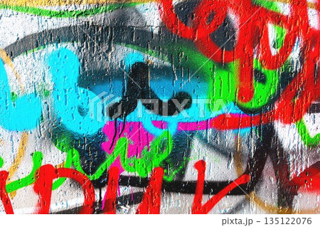 Colorful Spray Paint Street Art Graffiti on Concrete Wall, Neon Green, Red, Blue - Urban 2000s Style 135122076