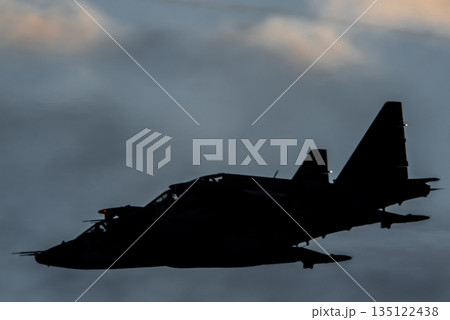 Two modern military jet fighters in clouds Two modern military jet fighters in clouds 135122438