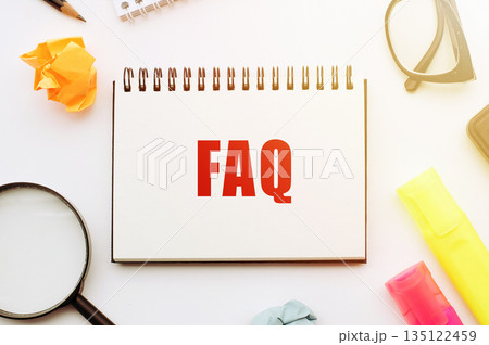 A notebook displaying the word FAQ sits next to a magnifying glass, symbolizing the act of finding answers to frequently asked questions. A notebook displaying the word FAQ sits next to a magnifying glass, symbolizing the act of finding answers to frequently asked questions. 135122459