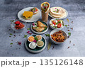 meal has a dinner on a table 135126148