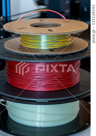 Spool of yellow pla filament for printing 3d printer Spool of yellow pla filament for printing 3d printer 135126543
