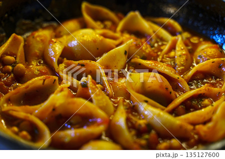 Conchiglie Pasta Shells with Rich Tomato Sauce and Chickpeas 135127600