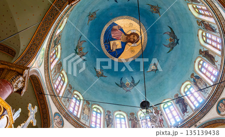 The interior of The Church of St. George in Cairo, Egypt. Drawing of Jesus under the ceiling. Coptic Cairo. Orthodox churches in Egypt. 135139438