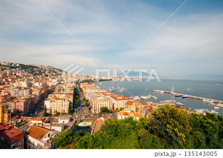Naples Italy cityscape with Mount Vesuvius and boats in the bay Naples Italy cityscape with Mount Vesuvius and boats in the bay 135143005
