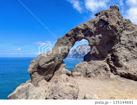 Natural Rock Arch with Ocean View, Spain, Tenerife, Los Gigantes 135144691