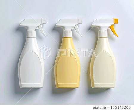 Home lifestyle appeal. Yellow sprays in a row. Disinfectant, glass cleaner, all-purpose surface cleaner. Mockup for branding cleaning product. 135145209