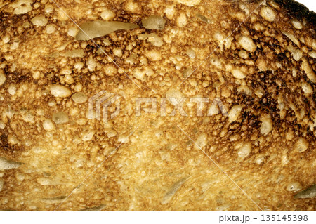A Close Up of a Toasted Home Made Bread Slice Toast Showing Texture 135145398