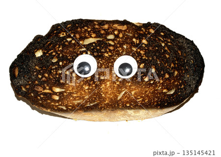 A Funny Burnt Toast Bread Slice Roll With Googly Wobble Eyes A Funny Burnt Toast Bread Slice Roll With Googly Wobble Eyes 135145421