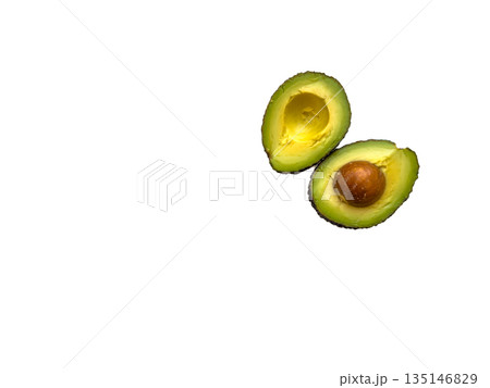 Fresh avocado halves on white background clean food still Fresh avocado halves on white background clean food still 135146829