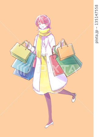 買い物袋をたくさん持った女性 笑顔 冬 買い物袋をたくさん持った女性 笑顔 冬 135147558