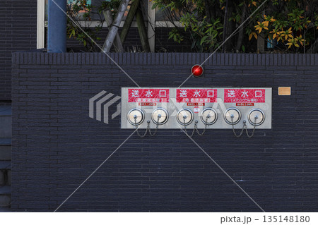 Fire hydrant standpipes or fireplug connection at high rise building for feed water into system when emergency occurred. Concept of fire equipment, safety, fire prevention. Fire hydrant standpipes or fireplug connection at high rise building for feed water into system when emergency occurred. Concept of fire equipment, safety, fire prevention. 135148180