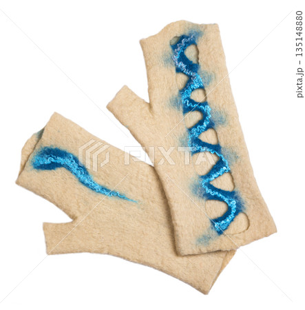 Mittens from felted wool on a white background 135148880