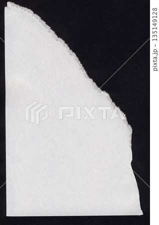 White torn paper edge creating abstract black space 135149128
