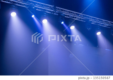 Light from stage lighting equipment in a concert hall 135150587