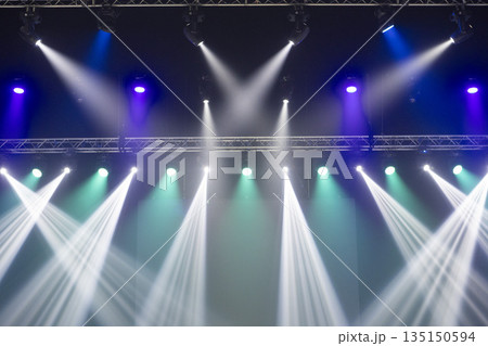 Light from stage lighting equipment in a concert hall 135150594