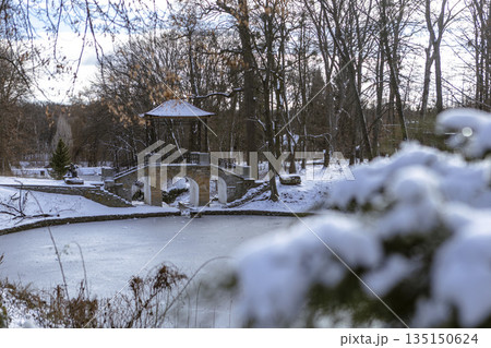 snowy winter park on a sunny day 135150624