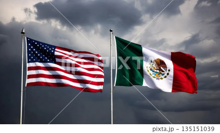 flags of america and mexico under a cloudy sky 135151039