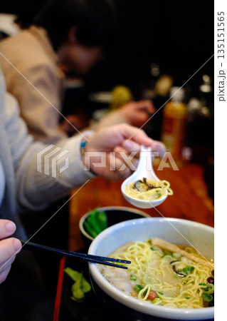 A delicious bowl of traditional Japanese ramen with pork, egg, noodles, and flavorful broth. A delicious bowl of traditional Japanese ramen with pork, egg, noodles, and flavorful broth. 135151565