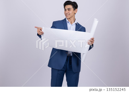 Professional engineer holding an open large blueprint. 135152245