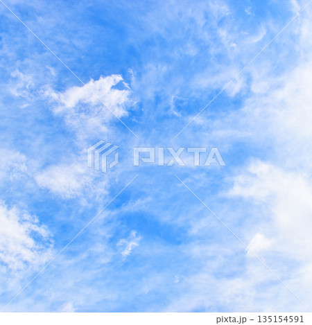 beautiful blue sky and white fluffy group of clouds with sunrise in the morning, natural background 135154591