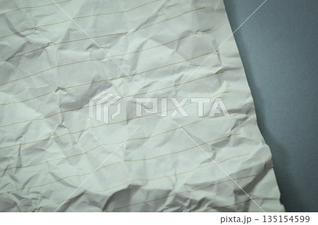 crumpled line paper texture on grey background, blank sheet notebook crumpled line paper texture on grey background, blank sheet notebook 135154599