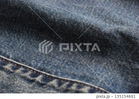 seam of blue denim texture background, jean fashion style 135154681