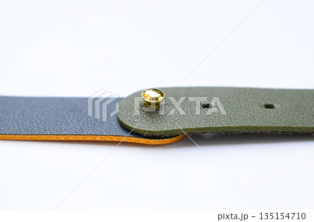 dark blue and green leather strap isolated on white background dark blue and green leather strap isolated on white background 135154710