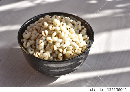 Boiled Job's tears in black bowl-Healthy Food. Boiled Job's tears in black bowl-Healthy Food. 135156042