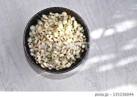 Boiled Job's tears in black bowl-Healthy Food. 135156044