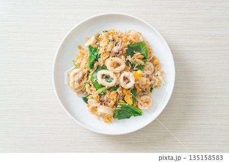 Fried rice with squid or octopus Fried rice with squid or octopus 135158583