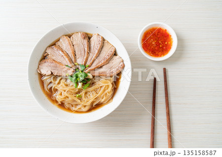 duck noodles with stewed duck soup 135158587