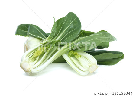 Fresh bok choy vegetables with vibrant green leaves and crisp white stems on a white background Fresh bok choy vegetables with vibrant green leaves and crisp white stems on a white background 135159344