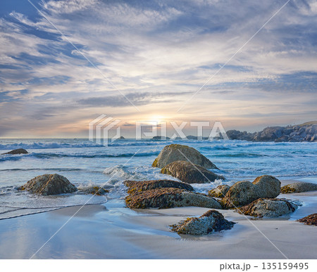 Rocks, beach and landscape with travel and ocean, environment and holiday destination in South Africa. Coastal location, nature and outdoor with seascape and tropical adventure with sea waves Rocks, beach and landscape with travel and ocean, environment and holiday destination in South Africa. Coastal location, nature and outdoor with seascape and tropical adventure with sea waves 135159495