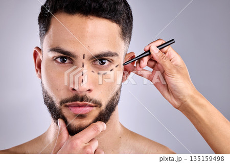 Man, face and plastic surgery marker for beauty in studio isolated on a white background. Facial, operation lines and cosmetics of male model, dermatology or skincare for serious rhinoplasty portrait Man, face and plastic surgery marker for beauty in studio isolated on a white background. Facial, operation lines and cosmetics of male model, dermatology or skincare for serious rhinoplasty portrait 135159498