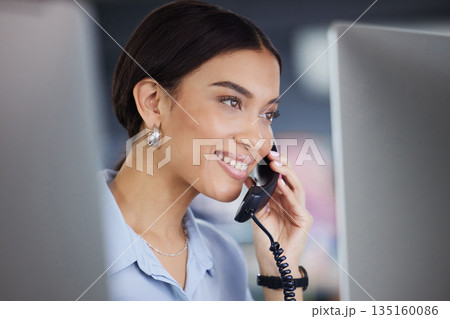 Consultant, woman with a telephone and at her desk in a office at her workplace. Customer service or telemarketing, support or online communication and female call center agent smile at workstation Consultant, woman with a telephone and at her desk in a office at her workplace. Customer service or telemarketing, support or online communication and female call center agent smile at workstation 135160086