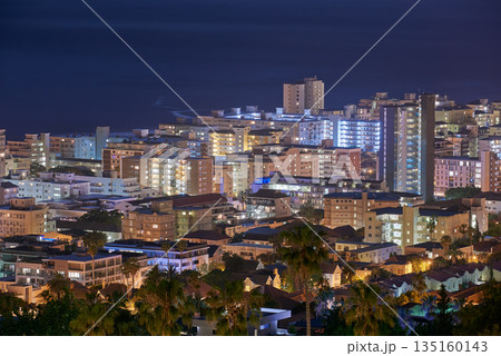 City, buildings and urban landscape at night, skyline and location with architecture, landmark and travel. Cityscape, skyscraper and Cape Town view for tourism, traveling and background destination City, buildings and urban landscape at night, skyline and location with architecture, landmark and travel. Cityscape, skyscraper and Cape Town view for tourism, traveling and background destination 135160143
