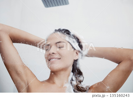 Shower shampoo, woman smile and hair wash for wellness, care and hygiene in a bathroom. Home, morning routine and cleaning with water for haircare, grooming and washing in house with female person Shower shampoo, woman smile and hair wash for wellness, care and hygiene in a bathroom. Home, morning routine and cleaning with water for haircare, grooming and washing in house with female person 135160243
