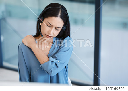 Call center, tired agent or woman with shoulder pain and headset in telemarketing, sales or crm office. Frustrated customer care consultant person back ache problem, burnout and posture or stress Call center, tired agent or woman with shoulder pain and headset in telemarketing, sales or crm office. Frustrated customer care consultant person back ache problem, burnout and posture or stress 135160762