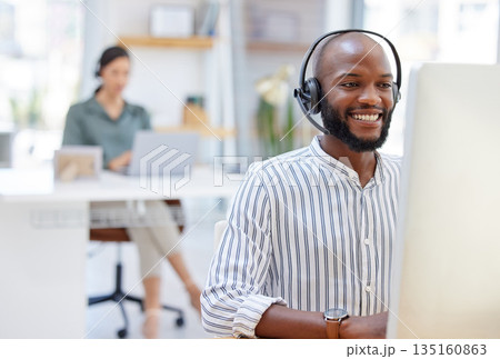 Call center, computer and happy man, virtual consultant or advisor in customer support, online advice and office. contact, communication and business agent or african person on desktop in workspace Call center, computer and happy man, virtual consultant or advisor in customer support, online advice and office. contact, communication and business agent or african person on desktop in workspace 135160863