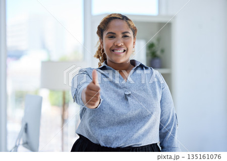 Portrait, thumbs up and happy business woman in office with winning, sign or thank you gesture. Face, smile and Indian female professional with hand emoji or vote for yes, like and satisfaction 135161076