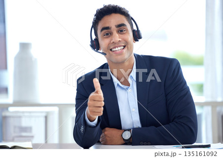 Portrait, thumbs up and business man in call center office for support, trust and success. Face, like hand gesture and happy person with excellence emoji, welcome and thank you for customer service. Portrait, thumbs up and business man in call center office for support, trust and success. Face, like hand gesture and happy person with excellence emoji, welcome and thank you for customer service. 135161092