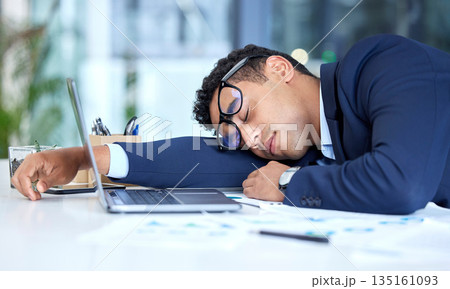 Tired, sleeping and business man in office with stress, burnout and low energy. Sleep, fatigue and male employee exhausted after challenge, problem and lazy crisis, overworked and sick in workplace. 135161093