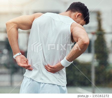 Fitness, back pain and man in city for running, workout or cardio with hurt, bruise or problem. Sports, injury and male runner outdoor with spine, muscle or bone, arthritis and sports accident Fitness, back pain and man in city for running, workout or cardio with hurt, bruise or problem. Sports, injury and male runner outdoor with spine, muscle or bone, arthritis and sports accident 135161272