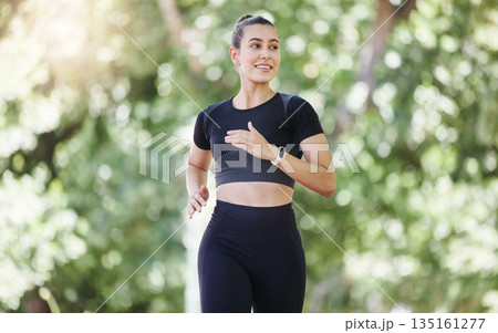 Smile, fitness or happy woman running in park training, cardio exercise or body workout for marathon. Wellness, athlete runner smiling or healthy sports girl exercising on jog outdoors in nature Smile, fitness or happy woman running in park training, cardio exercise or body workout for marathon. Wellness, athlete runner smiling or healthy sports girl exercising on jog outdoors in nature 135161277