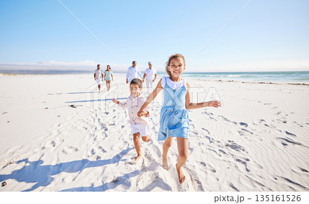 Big family, sea or happy kids holding hands, running or smiling in summer with happiness or joy in nature. Grandparents, smile or young children siblings bonding, playing or walking on beach sand Big family, sea or happy kids holding hands, running or smiling in summer with happiness or joy in nature. Grandparents, smile or young children siblings bonding, playing or walking on beach sand 135161526