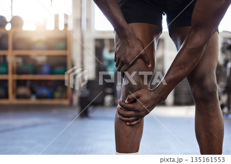 Closeup, fitness and black man with knee pain, injury or hurt with medical problem, workout or training. Zoom, male person or athlete with muscle tension, sport accident or leg tension with emergency Closeup, fitness and black man with knee pain, injury or hurt with medical problem, workout or training. Zoom, male person or athlete with muscle tension, sport accident or leg tension with emergency 135161553
