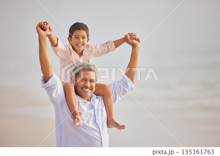 Piggyback, portrait or grandfather with child at sea as a happy family outdoors in nature together. Face, play or lovely grandparent with young boy or kid outside with freedom on fun summer holiday 135161763