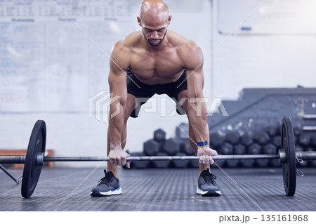 Male athlete, fitness and deadlift at the gym for muscles for a strong body for sport with motivation. Workout, barbell and man is training at a club for exercise with strength for weightlifting. Male athlete, fitness and deadlift at the gym for muscles for a strong body for sport with motivation. Workout, barbell and man is training at a club for exercise with strength for weightlifting. 135161968