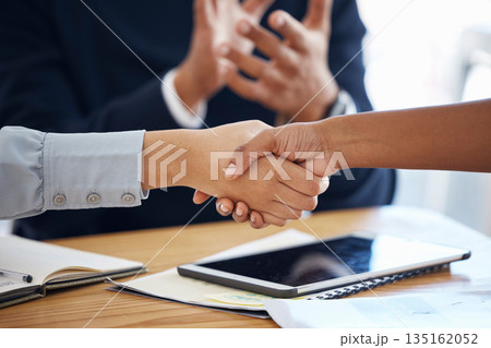 Thank you, colleagues shaking hands and in a business meeting in a modern office together. Partnership or collaboration, congratulations or agreement and coworkers with handshake for teamwork Thank you, colleagues shaking hands and in a business meeting in a modern office together. Partnership or collaboration, congratulations or agreement and coworkers with handshake for teamwork 135162052