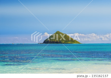 Tropical, island and ocean with sky or sunshine for vacation in hawaii or nature for calm, relax in outdoor. Travel, holiday and tropic with sea or mountain in summer for adventure with clouds. Tropical, island and ocean with sky or sunshine for vacation in hawaii or nature for calm, relax in outdoor. Travel, holiday and tropic with sea or mountain in summer for adventure with clouds. 135162137